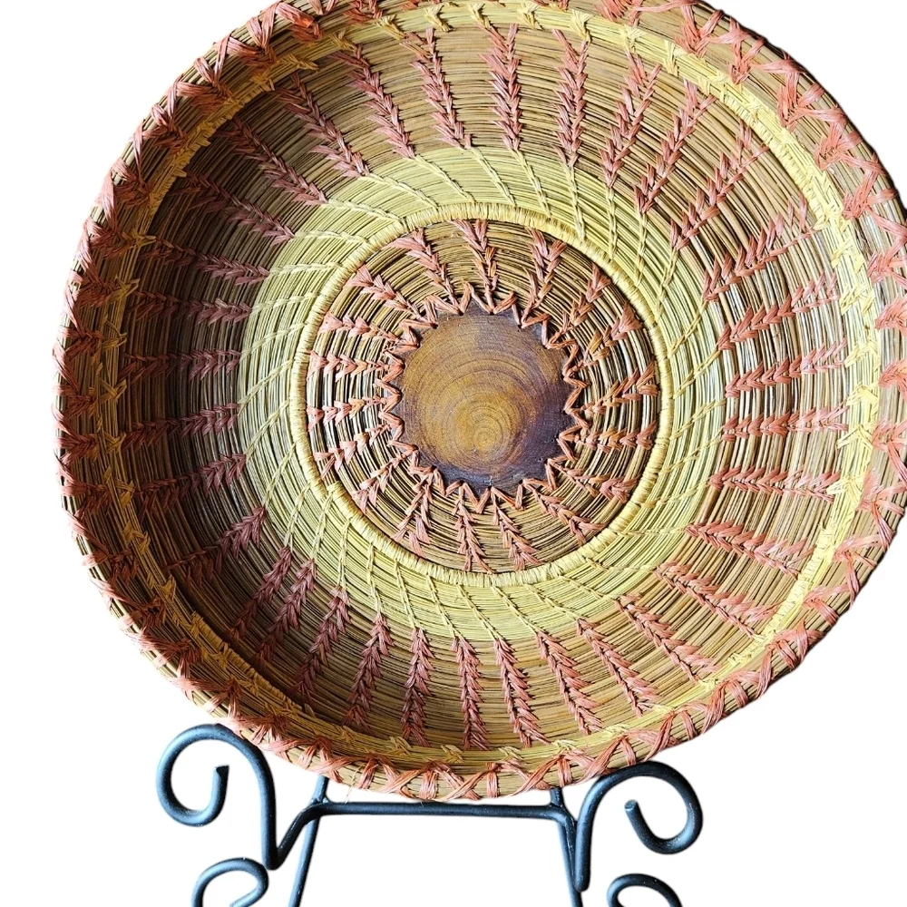 Primitive Handwoven 10 Inche Basket With A Wood Medallian In The Middle.
